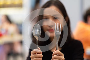 A hungry women waiting for some food