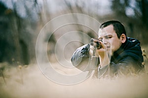 Hunter Aiming Gun photo