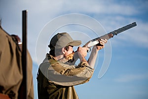 Hunter aiming the hunt during a hunting party