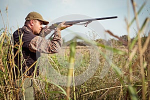 Hunter aiming the hunt during the hunting season