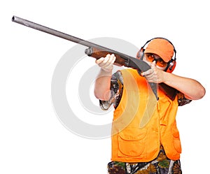 Hunter aiming a shotgun