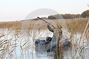 Hunter in a boat