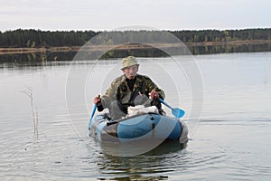 Hunter in a boat