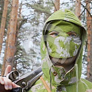 Hunter in camouflage photo