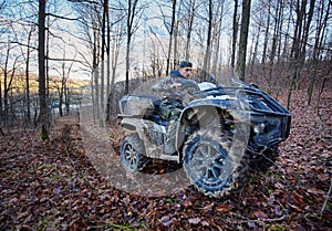 Hunter on quad bike