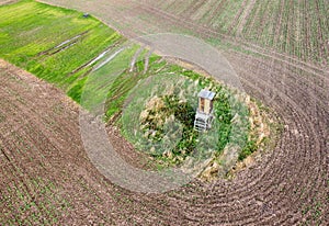 A hunter`s seat from the air in a agrar field