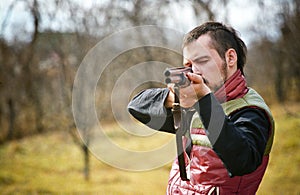 Hunter taking aim photo