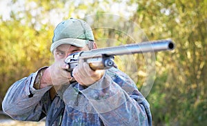 Hunter taking aim at the target.