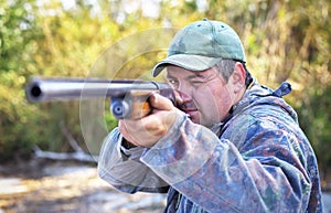 Hunter taking aim at the target.