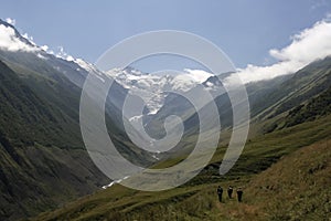 Hunters climb the mountains through the gorge