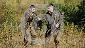 Hunters friends enjoy leisure. Poacher partner in crime. Activity for real men concept. Hunters gamekeepers looking for