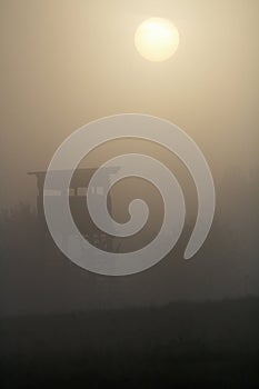 Hunters hide for hunting and wildlife observation. Hunting structure in the morning fog