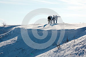 Hunters walking in snow