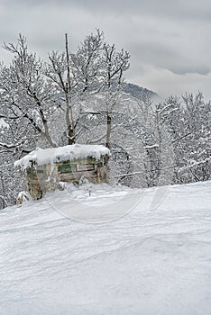 Hunting cabin in the snow