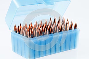 Hunting cartridges in a plastic box. Bullet storage box.