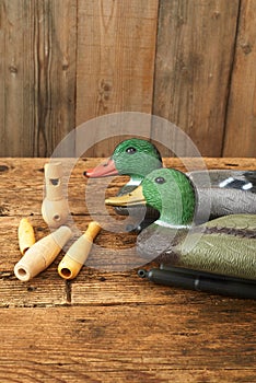 Hunting. Duck decoys with wooden whistles.