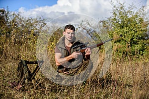 Hunting equipment and safety measures. Man with rifle hunting equipment nature background. Prepare for hunting. What you