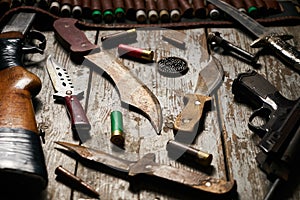 Hunting equipment on wooden background