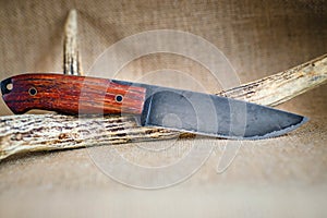 Hunting knife with burnished blade