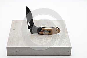 hunting knife on a gray background