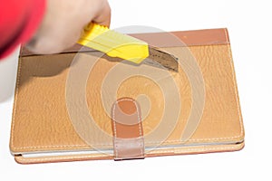 Hunting knife and an open notebook in