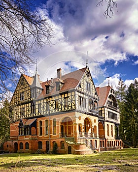 Hunting lodge under sky with clouds in Gelbensande. Germany