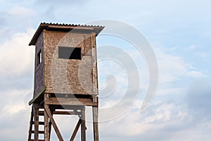 Hunting observation tower in the fields