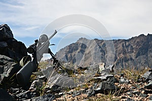 Hunting rifle with a telescopic sight, a bipod while hunting photo