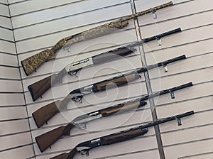 Hunting rifles on the stand of the store