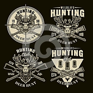 Hunting set of four vector light emblems on dark