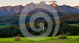 Hunting tower against the backdrop of the Panorama of the Tatra Mountains in Poland in the beautiful light of the rising sun