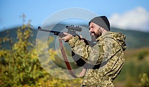 Hunting and trapping seasons. Hunting masculine hobby. Man brutal gamekeeper nature background. Hunter hold rifle