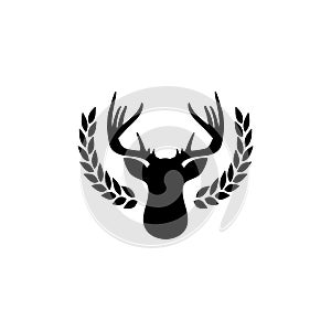 Hunting trophy. Deer head with big antlers in laurel wreath isolated on white background