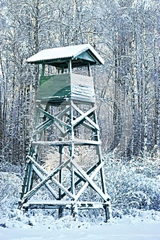 Hunting wooden observation tower in winter weather