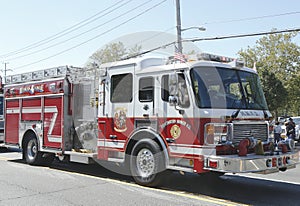 Huntington Manor Fire Department fire truck at the parade in Huntington , New York