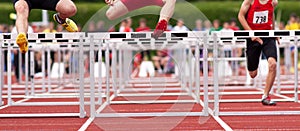 Hurdles sprint in track and field photo