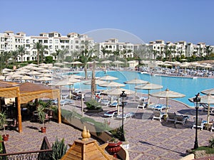 Hurghada, Egypt - March 20, 2020: a beautiful general view of the hotels in Hurghada, pool, umbrellas, sun loungers. Beach Holiday