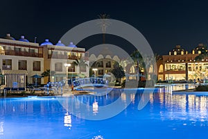 Hurghada, Egypt. November 19 2018 luxury resort with pool at night view. hotel outdoor landscape with pool. Night pool side of