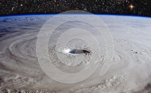 Hurricane cyclone storm with eye from above photo