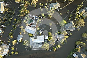 Hurricane Ian flooded houses in Florida residential area. Natural disaster and its consequences