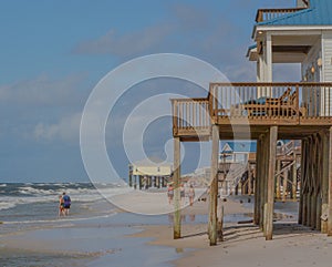 Hurricane Ida eroded beach sand from the stilts of homes on the Gulf of Mexico, Dauphin Island, Mobile County, Alabama