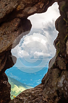 Hurricane over the mountains view through crevices