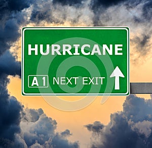 HURRICANE road sign against clear blue sky