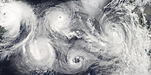 Hurricane season. Collage of a riot of hurricanes due to catastrophic climate change. Satellite view