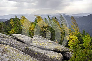 Hurricane wind in autumn mountains