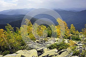 Hurricane wind in autumn mountains