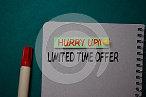 Hurry Up Limited Time Offer write on a sticky note isolated on green background