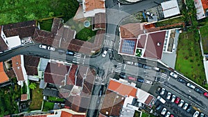 Hurrying car riding valley crossroads aerial top view. Roadway lonely vehicle