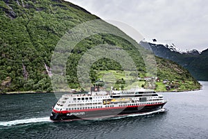 Hurtigruten coastal vessel TROLLFJORD in the Geirangerfjord, Norway