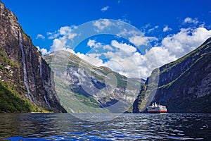 Hurtigruten cruise liner sailing on the Geirangerfjord, one of the most popular destination in Norway